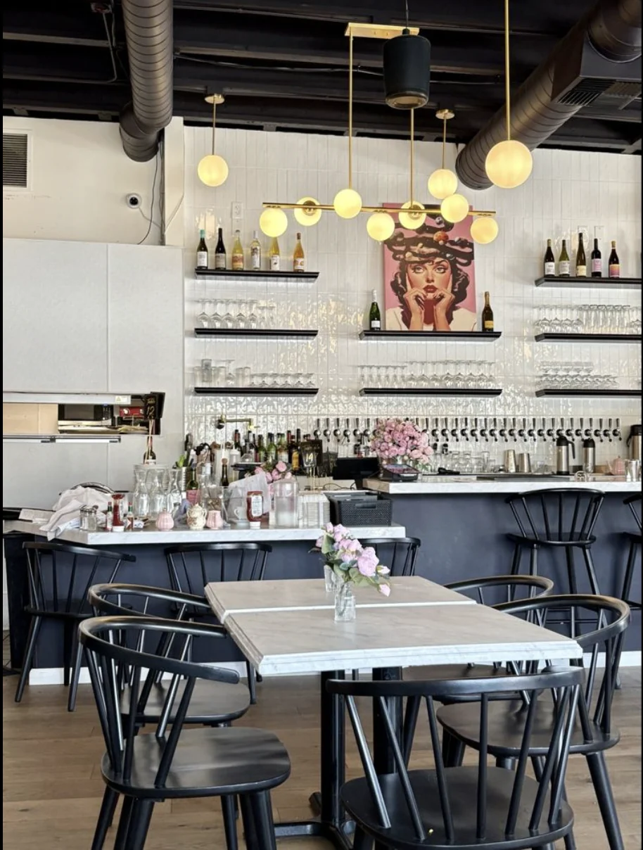 Warm lighting and the dining room at Epicure Club